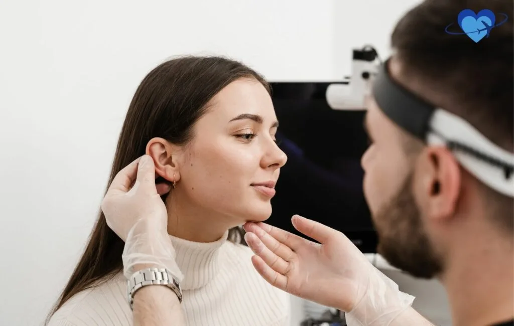 This image captures a pre-surgical medical assessment for an ear lift (otoplasty) in Colombia, an essential step to ensure a safe and successful procedure. During this evaluation, specialists assess the patient's ear structure, medical history, and surgical goals, providing a personalized treatment plan. Otoplasty in Colombia is a sought-after cosmetic procedure for improving ear shape, symmetry, and proportion. With world-class surgeons, affordable prices, and high-quality care, Colombia is a top destination for ear lift surgery, offering excellent results and a smooth recovery process.
